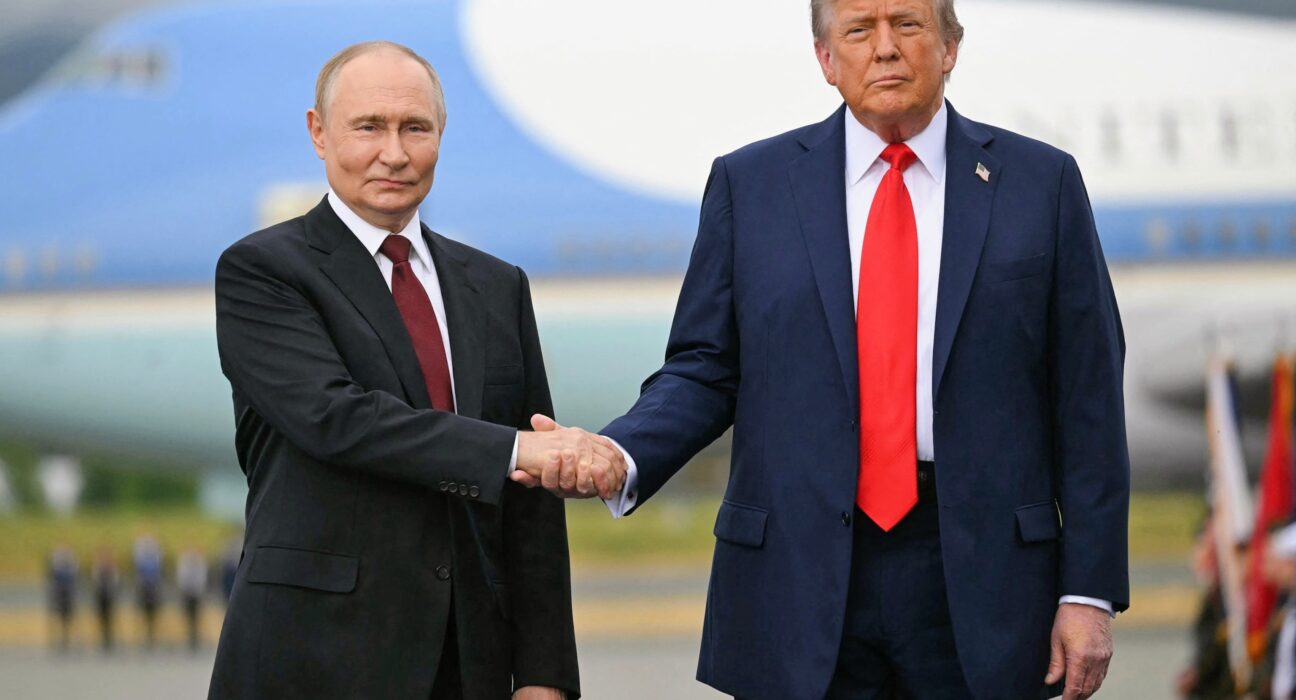 Donald Trump and Vladimir Putin walking side-by-side at the Alaska summit.
